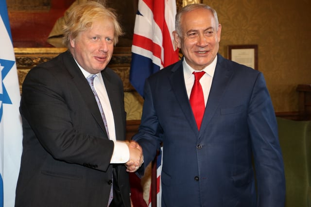 Johnson with Israel's Benjamin Netenyahu in June 2018
