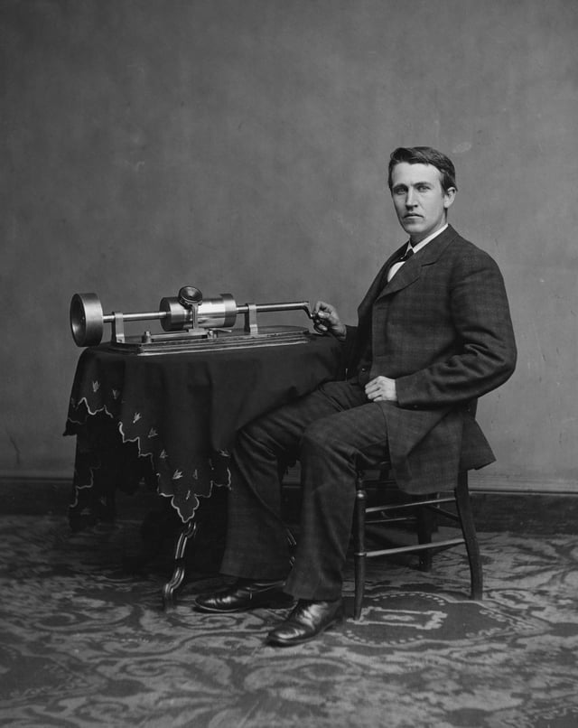 Photograph of Edison with his phonograph (2nd model), taken in Mathew Brady's Washington, D.C. studio in April 1878.