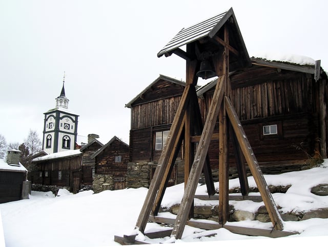 The 17th-century town of Røros, designated in 1980 as a UNESCO World Heritage Site, has narrow streets and wooden houses.