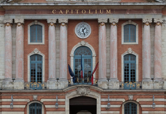Mourning flags of the European Union, France and Midi-Pyrénées on the Capitole de Toulouse after the antisemitic attacks.