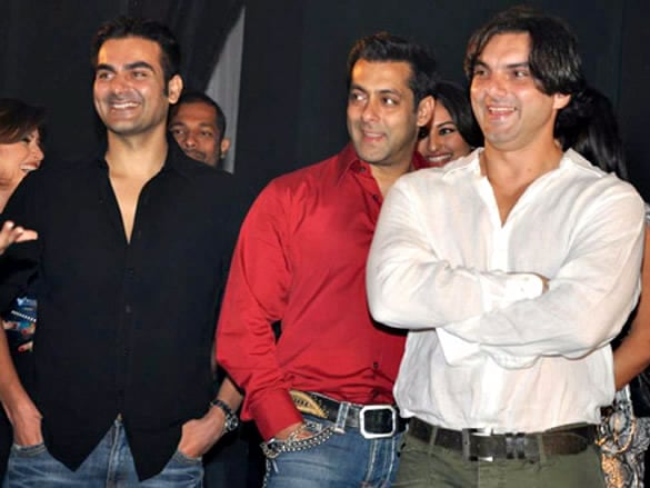 Khan with brothers Arbaaz Khan (left) and Sohail Khan (right)