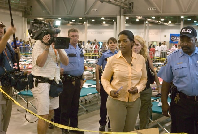 Winfrey visits evacuees from New Orleans temporarily sheltered at the Reliant center in Houston following Hurricane Katrina.