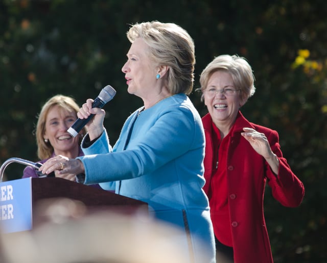 Clinton campaigning in Manchester, New Hampshire in October 2016. New Hampshire Governor Maggie Hassan (left) and Massachusetts Senator Elizabeth Warren (right) in the background.