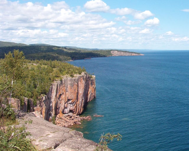 Palisade Head on Lake Superior was formed from a Precambrian rhyolitic lava flow.