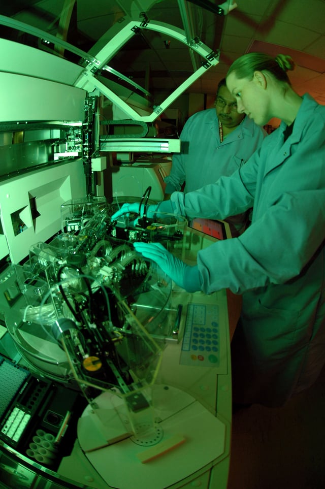 An allergy testing machine being operated in the diagnostic immunology lab