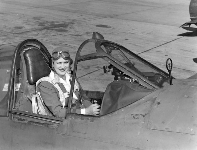 Jackie Cochran in the cockpit of a P-40 fighter aircraft. She was head of the Women Airforce Service Pilots (WASP).