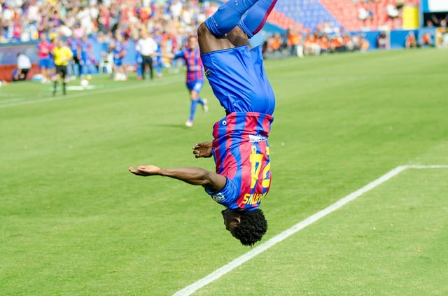Martins (pictured with Levante in 2012) is known for celebrating a goal with a backflip