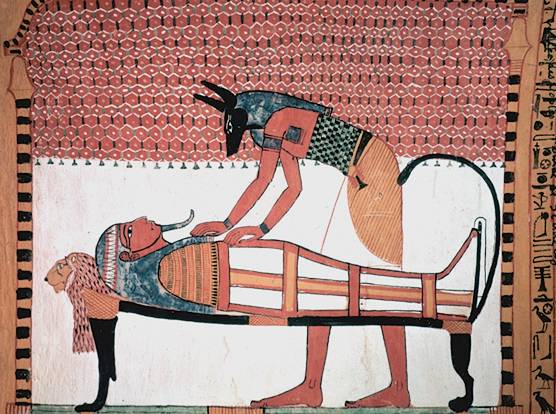 Anubis was the ancient Egyptian god associated with mummification and burial rituals; here, he attends to a mummy.