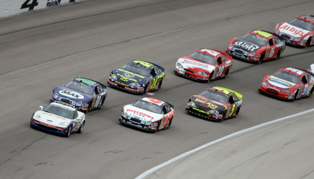 The Busch Series field following the pace car at the O'Reilly 300 at Texas Motor Speedway in 2007.