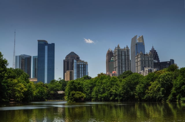 The skyline of Midtown (viewed from Piedmont Park) emerged with the construction of modernist Colony Square in 1972.
