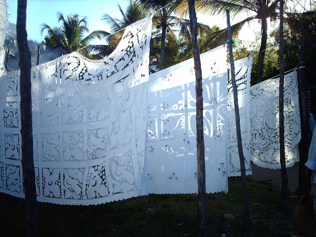 Embroidered tablecloths are produced for sale to tourists at Nosy Komba.