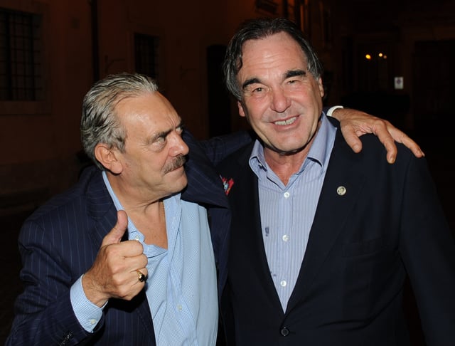 Oliver Stone with Rino Barillari in "Piazza dé Ricci" exit of the restaurant "Pierluigi" in Rome – September 25, 2012