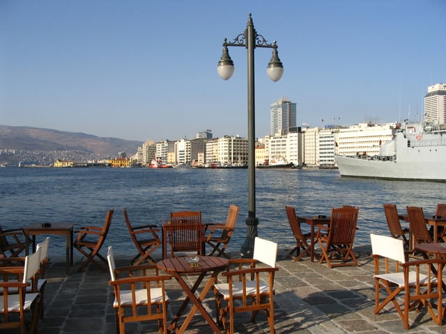 A distant view of the Pasaport Quay (1877) in the background, as seen from Konak Pier (1890) at the port of İzmir.