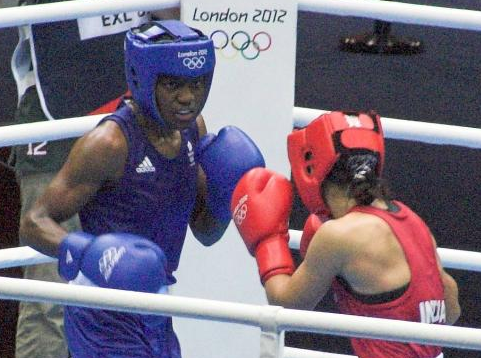 Nicola Adams is the first female boxer to win an Olympic gold medal. Here with Mary Kom of India.