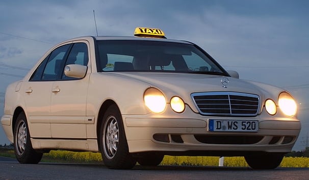 Officially licensed taxis are always ivory coloured.