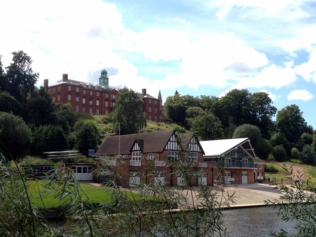 Shrewsbury School, with its boathouse on the River Severn in the foreground.