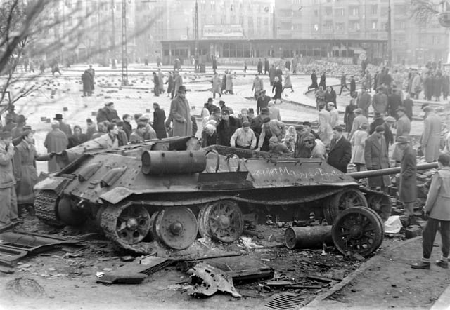 A destroyed Soviet tank in Budapest during the 1956 Revolution; Time's Man of the Year for 1956 was the Hungarian Freedom Fighter