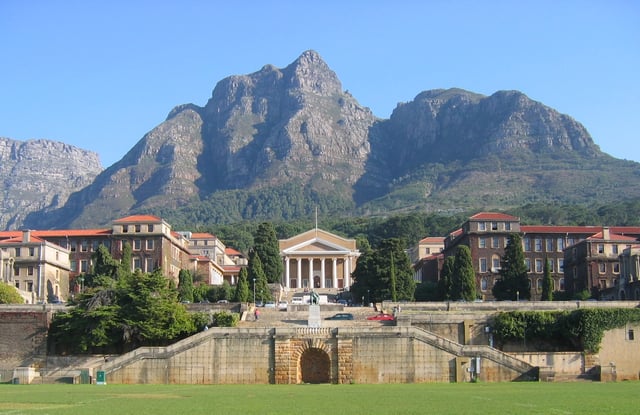 A view of Upper Campus, looking west from the rugby fields that separate Upper Campus from Middle Campus, with Devil's Peak in the background.