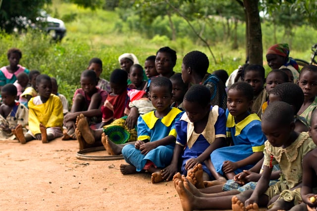 Children attending a farmer meeting in Nalifu village, Mulanje, Malawi.