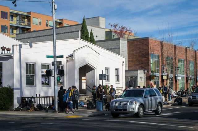 Hungry diners line up outside a church for a free Thanksgiving meal in Eugene, Oregon, in 2013