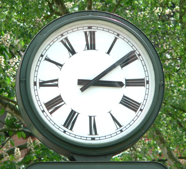A typical clock face with Roman numerals in Bad Salzdetfurth, Germany