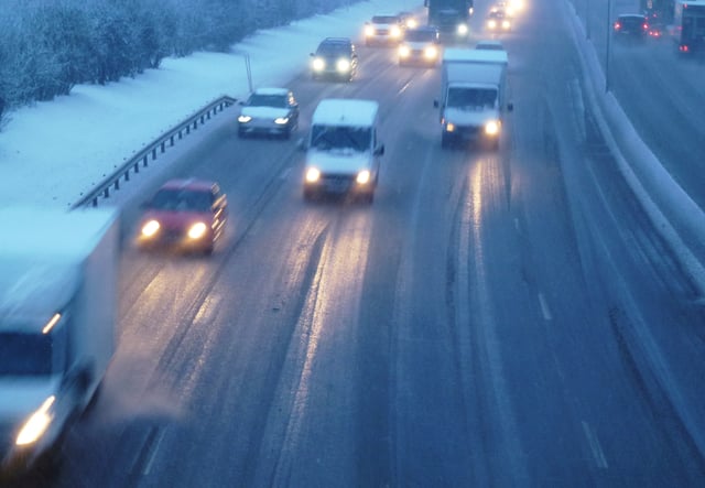 Road ice decreases tire traction, thereby affecting driving safety.