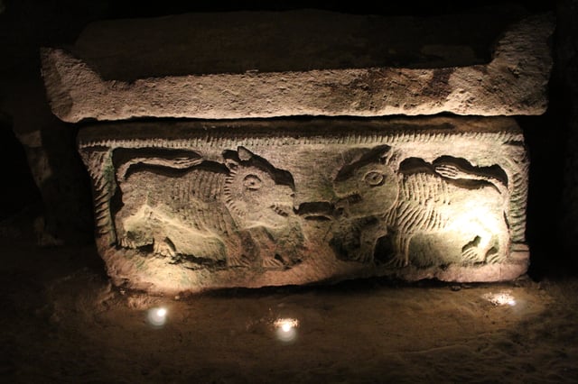 Two lions facing each other, a Greek mythological scene decorating a sarcophagus in the Cave of the Coffins