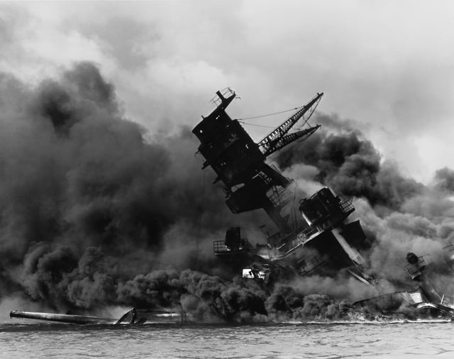 USS Arizona burned for two days after being hit by a Japanese bomb in the attack on Pearl Harbor.