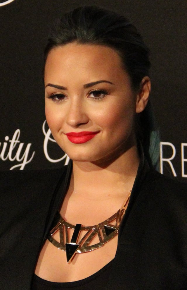 Lovato at the Redlight Traffic's Inaugural Dignity Gala in October 2013
