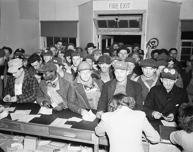 Hanford workers collect their paychecks at the Western Union office.