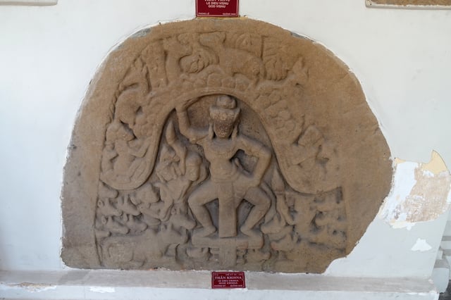Krishna lifts "Govardhan" mountain, a 7th-century artwork from a Da Nang, Vietnam, archaeological site