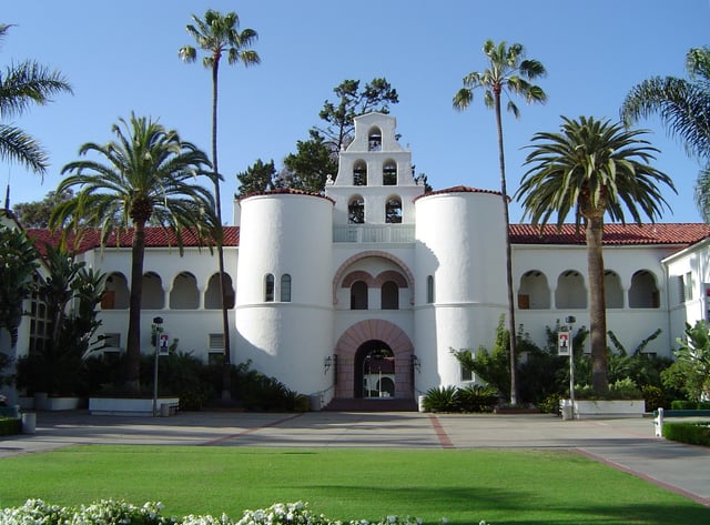 A landmark architecture (Hepner Hall) featured in the school's logo