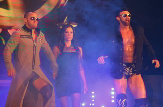 Magnus (right) with Desmond Wolfe and his valet Chelsea in July 2010