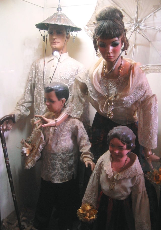 Typical costume of a Principalía family of the late 19th century. Exhibit in the Villa Escudero Museum, San Pablo, Laguna, Philippines.
