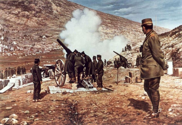 Crown Prince Constantine watches heavy artillery during the Battle of Bizani.