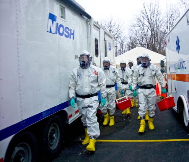 A team of emergency responders performs a training scenario involving anthrax.