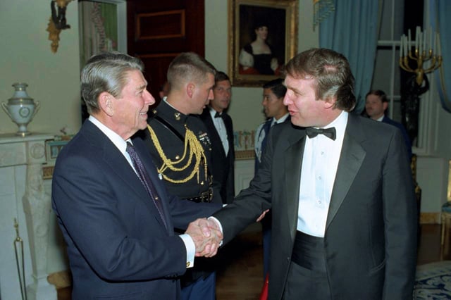 Trump meets with President Ronald Reagan at a 1987 White House reception.