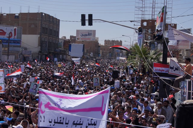 Tens of thousands of protesters marching to Sana'a University, joined for the first time by opposition parties, during the 2011–2012 Yemeni revolution