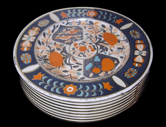A Huntley & Palmers biscuit tin made to look like a stack of Derby porcelain plates