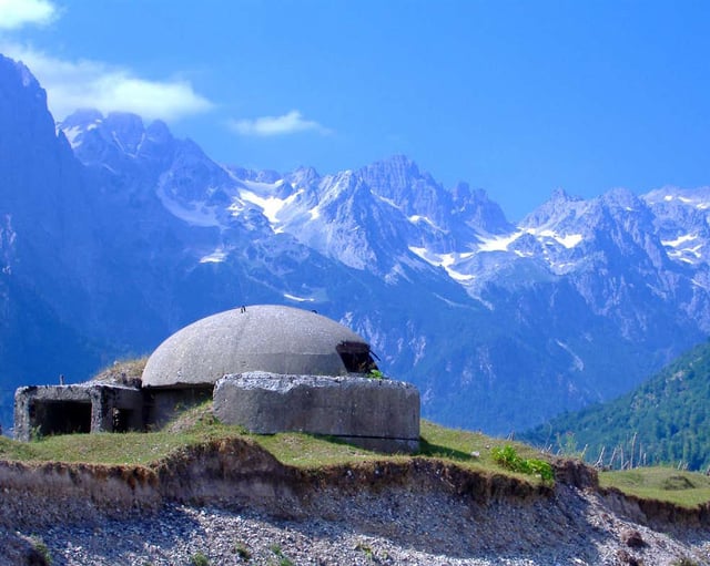 A bunker overlooking the Albanian Alps. By 1983, approximately 173,371 concrete bunkers were counted across the country.