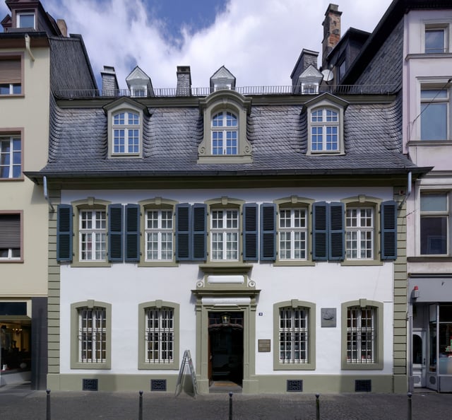 Marx's birthplace, now Brückenstraße 10, in Trier. The family occupied two rooms on the ground floor and three on the first floor. Purchased by the Social Democratic Party of Germany in 1928, it now houses a museum devoted to him.