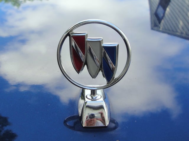A trishield, the Buick symbol, hood ornament on a 1990 LeSabre Custom