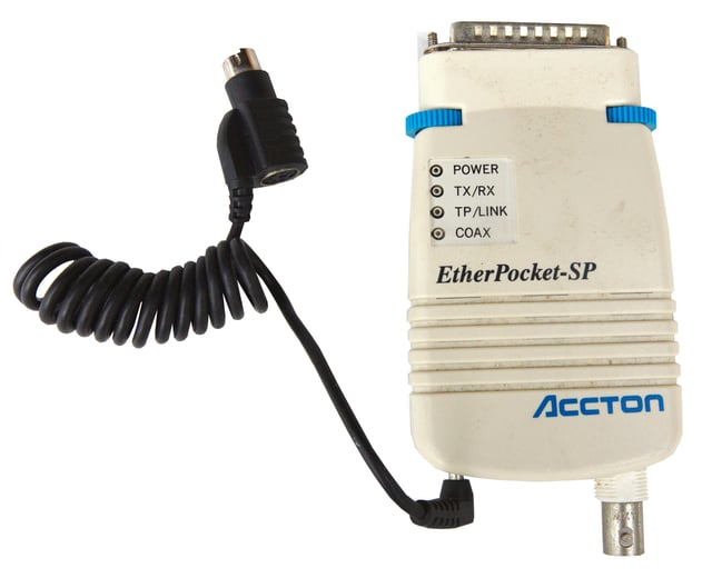 Accton Etherpocket-SP parallel port Ethernet adapter (circa 1990). Supports both coaxial (10BASE2) and twisted pair (10BASE-T) cables. Power is drawn from a PS/2 port passthrough cable.