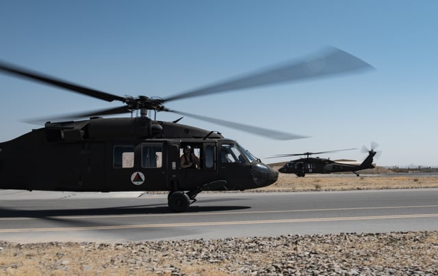Black Hawks of the Afghan Air Force at Kandahar Airfield. As a major non-NATO ally, the Afghan Armed Forces receive most of their equipment and training from the United States.