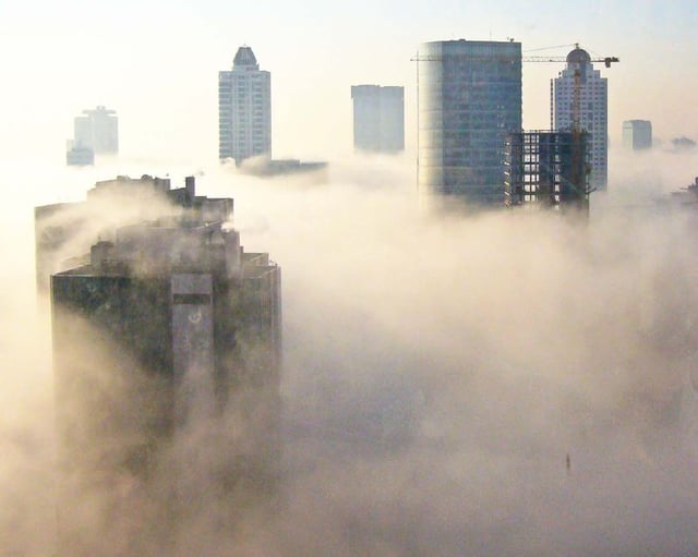 Fog, seen here shrouding Levent, frequently forms in the morning.