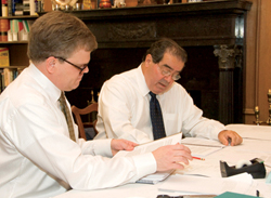 Scalia (right) works on a book with Bryan A. Garner.