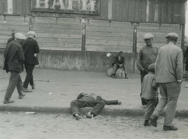 A starved man on the streets of Kharkiv, 1933. Collectivization of crops and their confiscation by Soviet authorities led to a major famine known as the Holodomor.