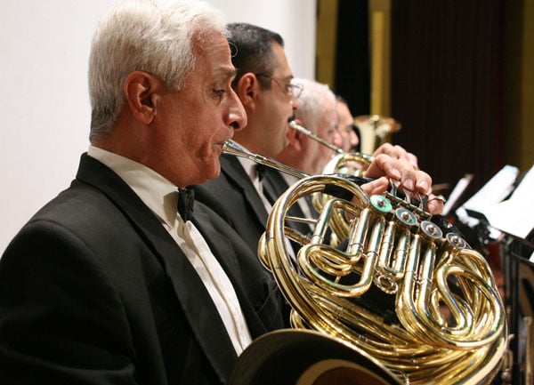 The Iraqi National Symphony Orchestra, officially founded in 1959, performing a concert in Iraq in July 2007.