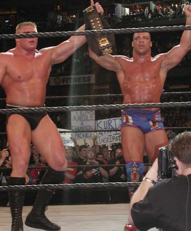 Lesnar and Kurt Angle after their WWE Championship match at WrestleMania XIX