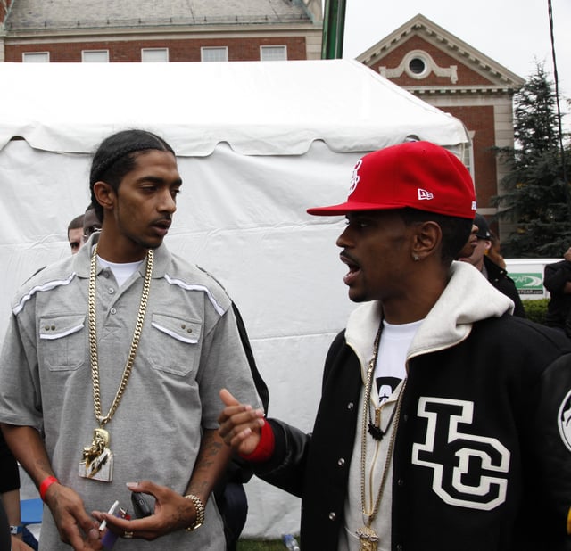 Hussle (left) with rapper Big Sean (right) in 2009.